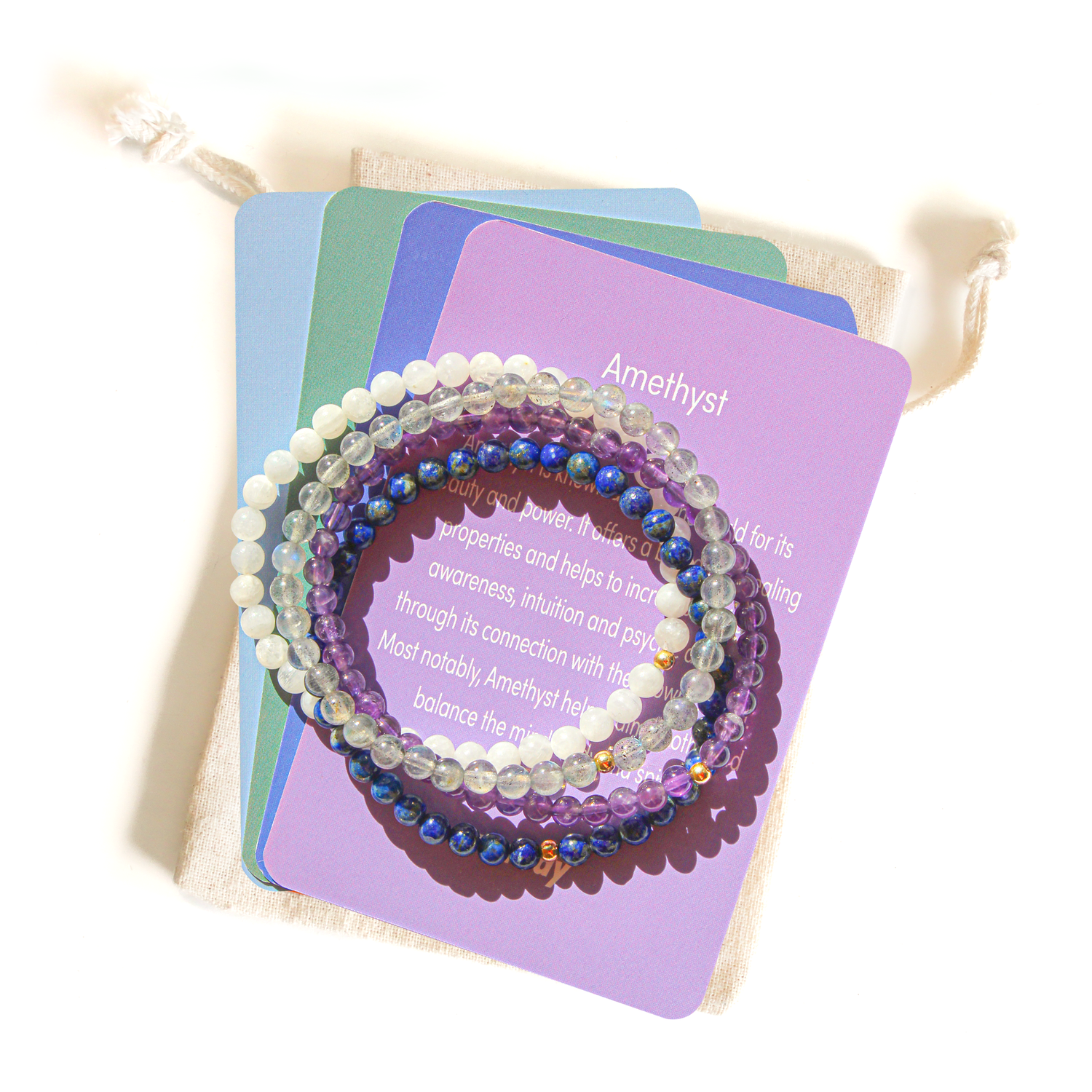 Crystal bracelet set with amethyst, moonstone and lapis lazuli on meaning cards with pouch, Azenway jewelry
