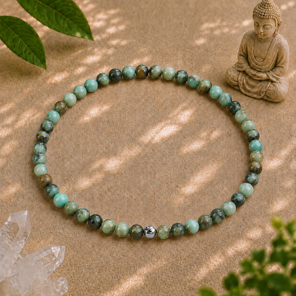 African turquoise crystal bracelet with 4mm marbled gemstone beads and a single 925 sterling silver accent bead on a warm neutral zen backdrop.