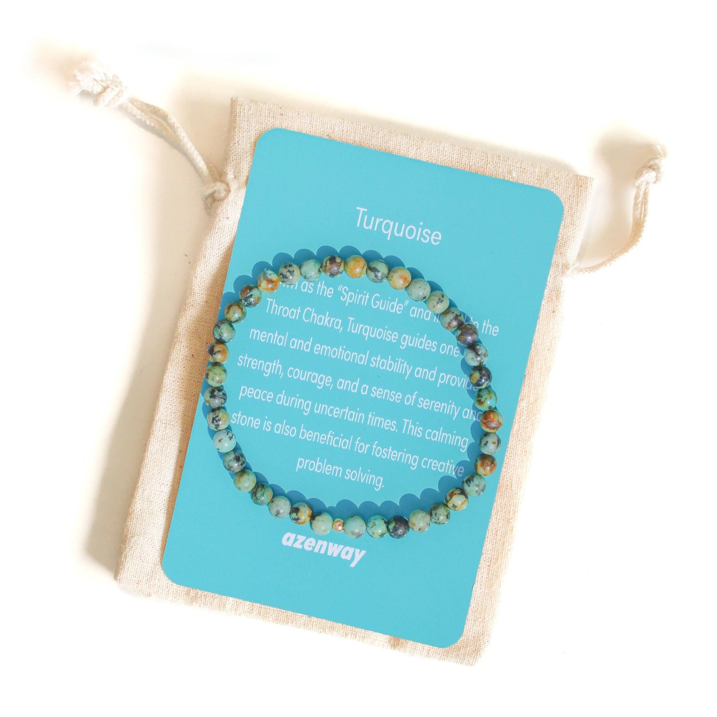 African Turquoise gemstone bracelet displayed on its Azenway meaning card with organic cotton pouch.