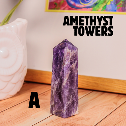 Amethyst crystal tower labeled A polished purple stone point photographed on wooden surface