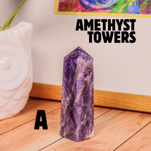 Amethyst crystal tower labeled A polished purple stone point photographed on wooden surface