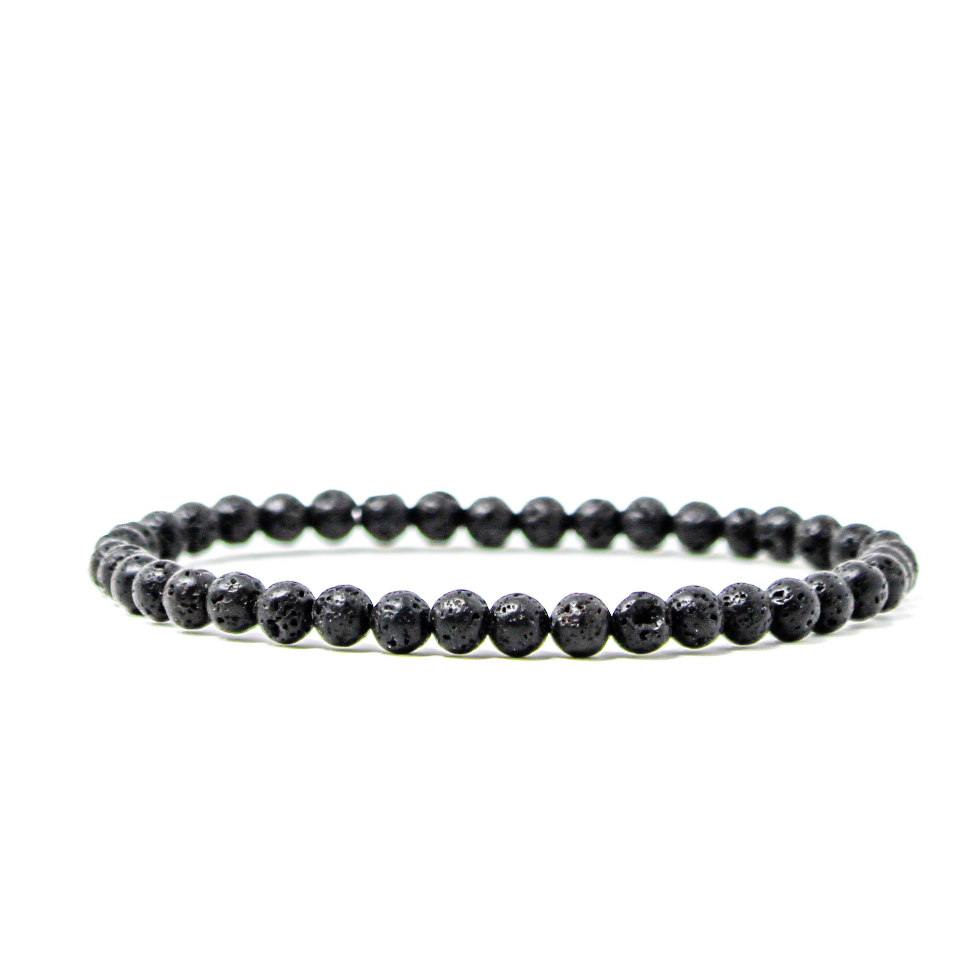 Minimalist 4mm black lava stone bracelet made from natural porous volcanic beads.