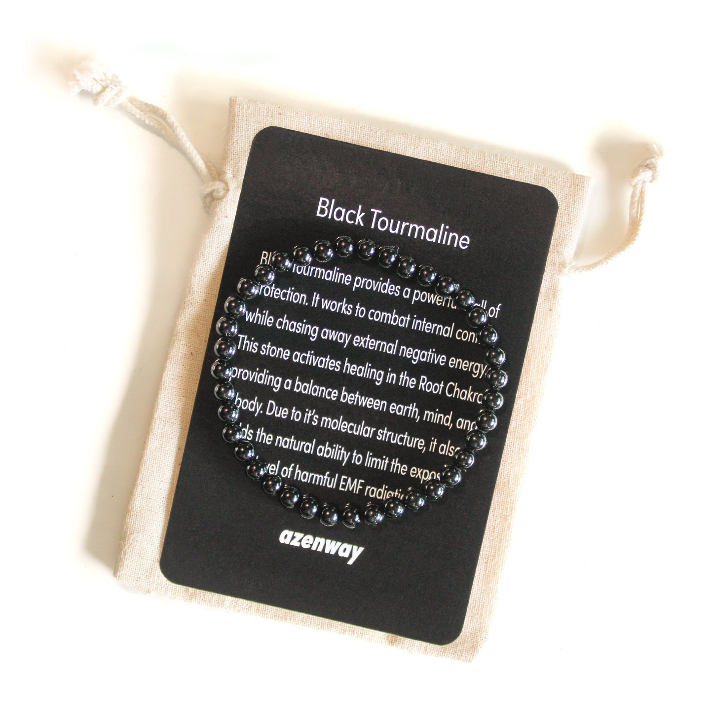 Black Tourmaline 4mm bracelet displayed on Azenway meaning card and linen pouch.