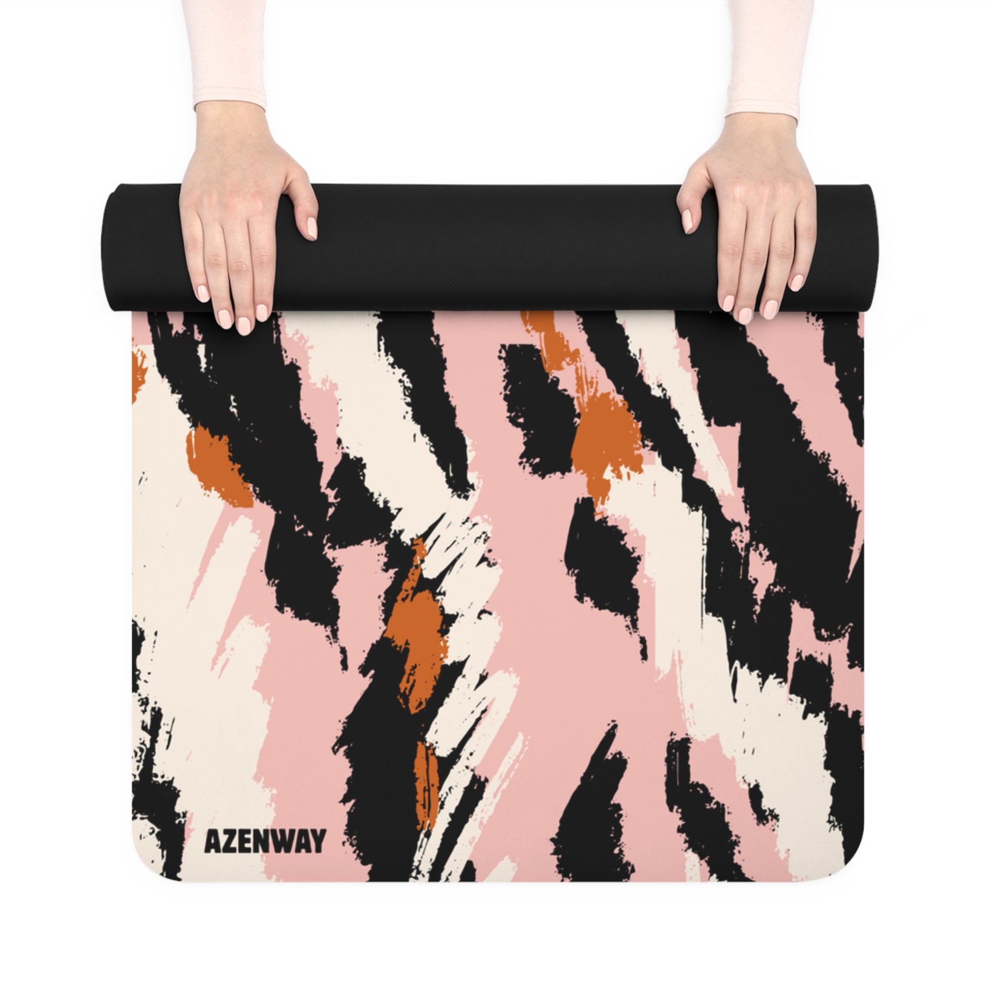 Yoga mat with abstract pattern held by a person on a white background