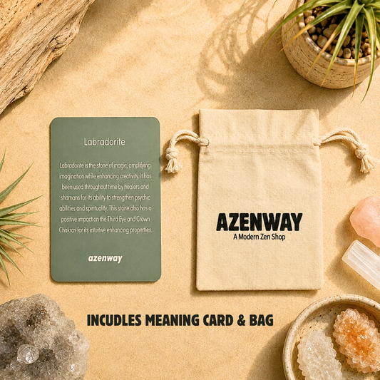 Labradorite meaning card and natural cotton drawstring bag included with every Labradorite purchase. Displayed on a warm zen-inspired backdrop with crystal accents, this complimentary gift set provides stone information and reusable storage.