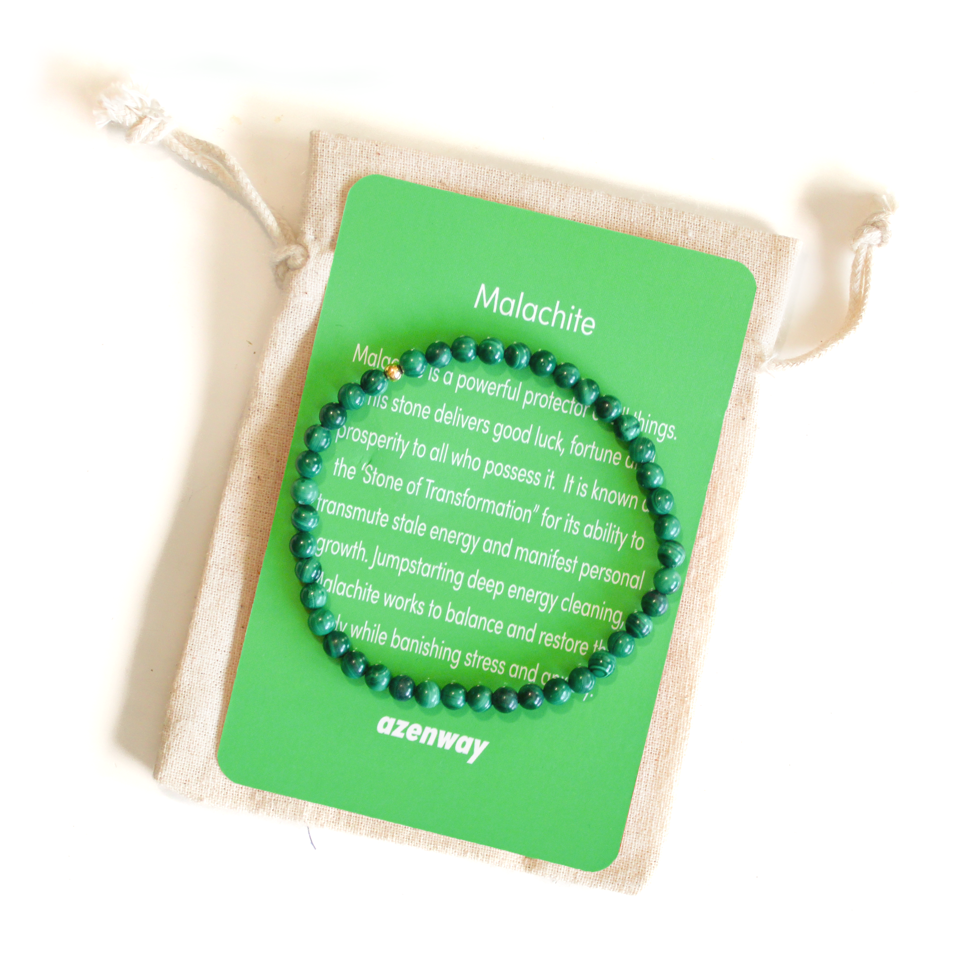 Malachite gemstone bracelet displayed on green Azenway meaning card and cotton gift bag.