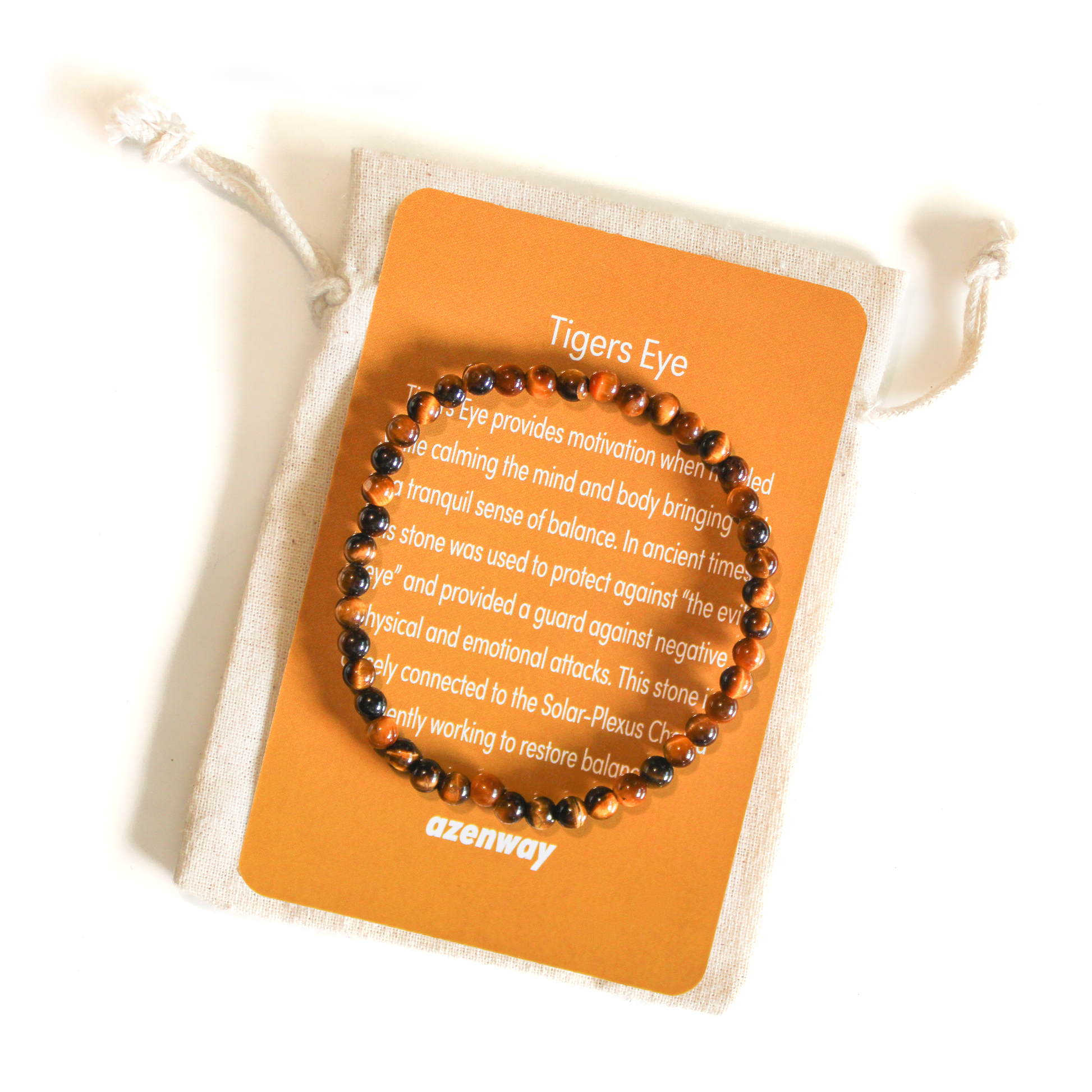 Tiger’s Eye gemstone bracelet displayed on its Azenway meaning card and cotton gift bag.