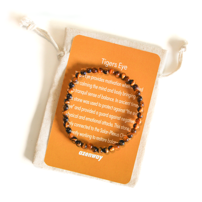 Tiger’s Eye gemstone bracelet displayed on its Azenway meaning card and cotton gift bag.